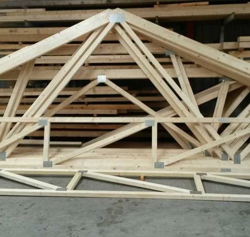 Wooden building materials connected with metal nail plates