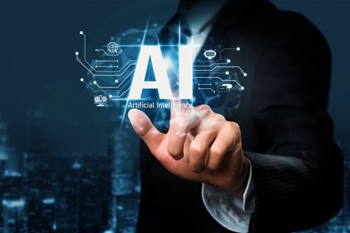 Businessperson pointing at a digital interface with "Artificial Intelligence" text, symbolizing AI technology integration in a corporate environment, over a cityscape background