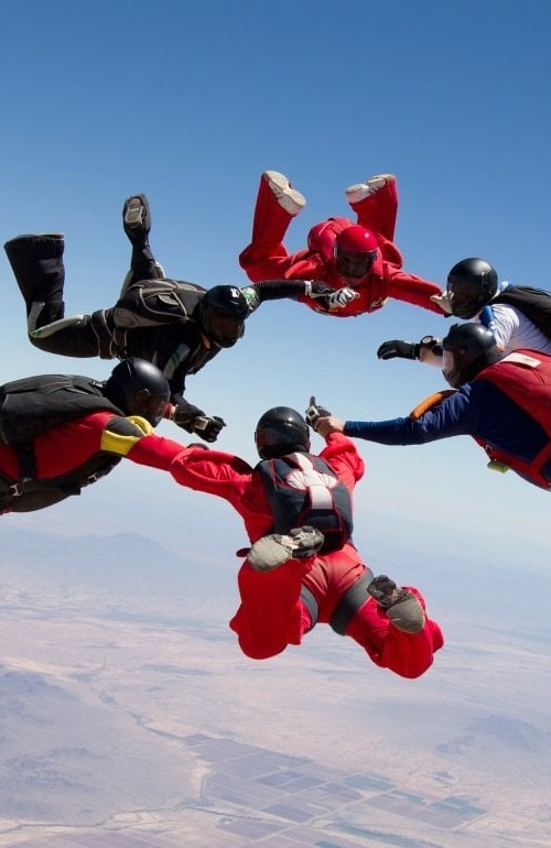 Skydivers in a circle