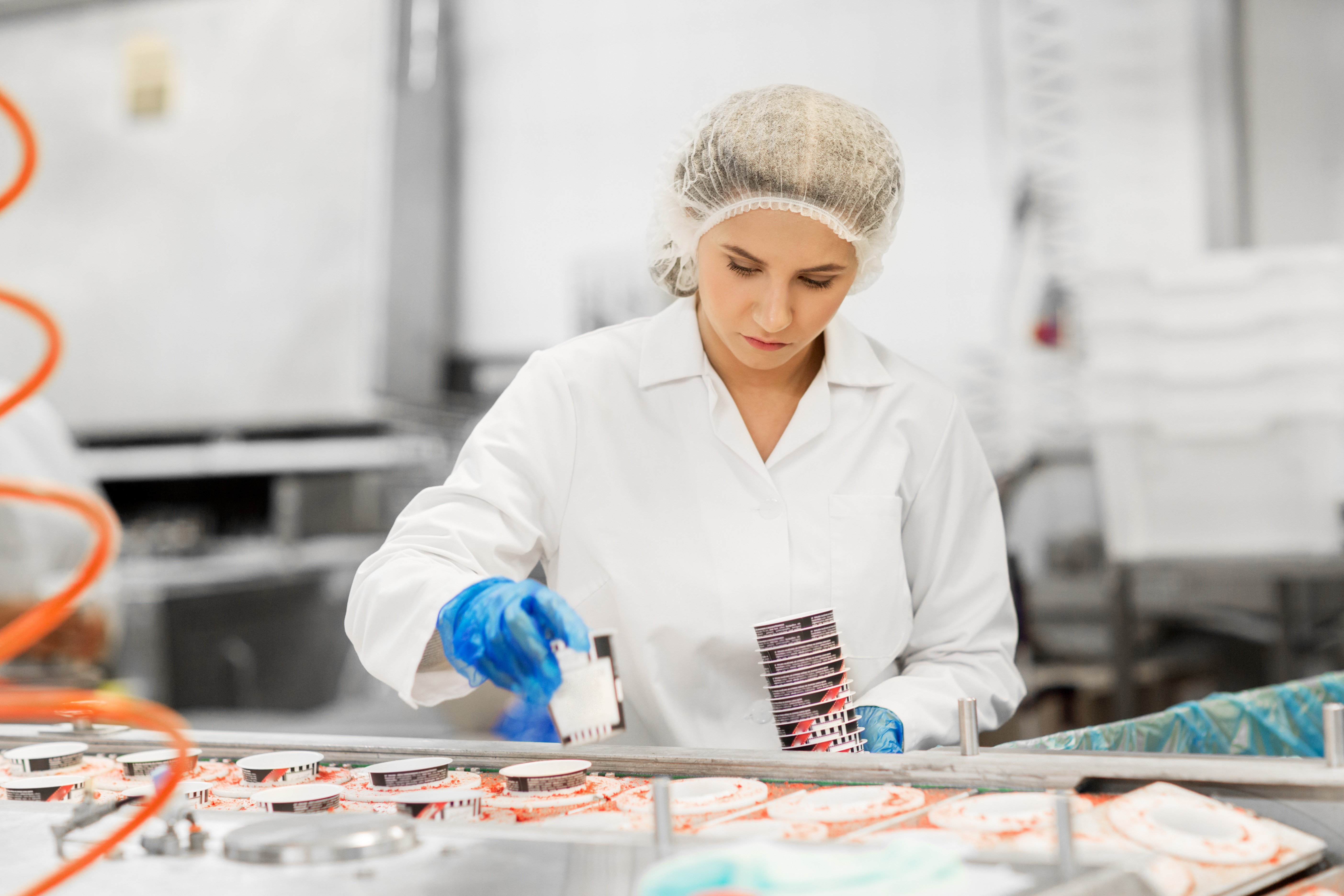 Kiwa auditor inspecting a food factory