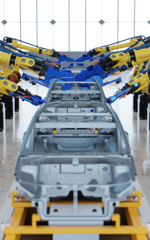 Robotic arms assembling a car frame in an automotive factory.