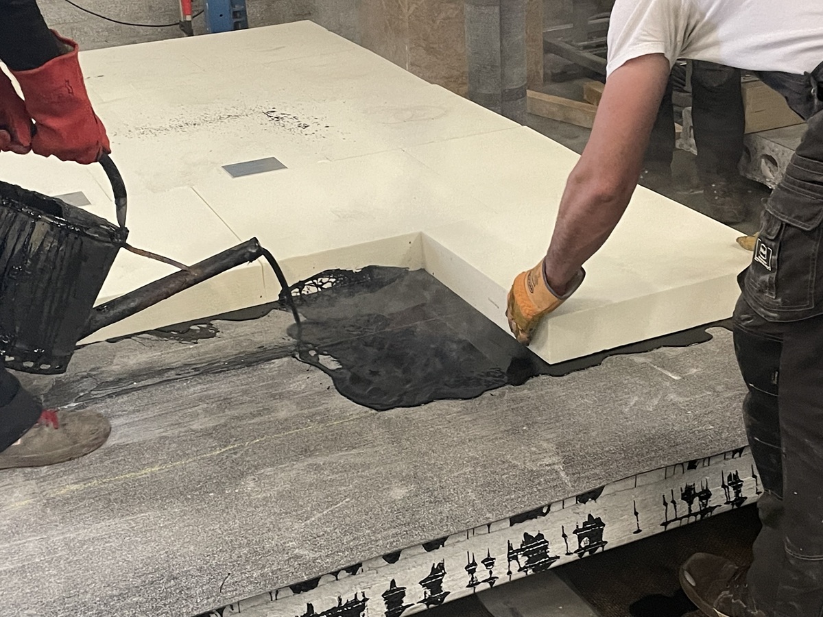 Dakopbouw gieten met gieter