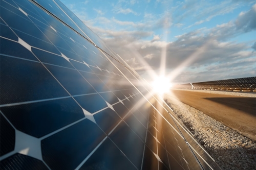Solar panels with a sunset